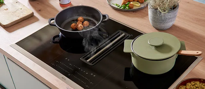 Kochfeld mit integrierten Downdraft Dunstabzug.