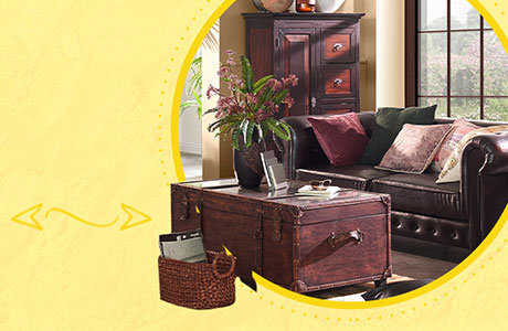 Vintage-Einrichtung bestehend aus Couchtisch in Truhenoptik, Ledersofa im Chesterfield-Look, Highboard im Vintage-Stil