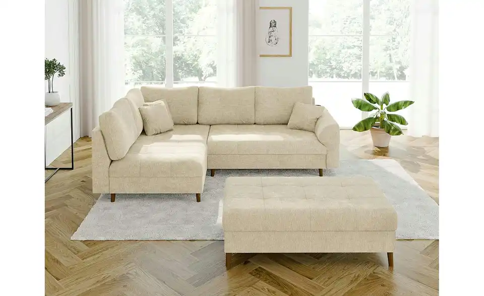 Ecksofa mit Hocker, in Wohnsituation