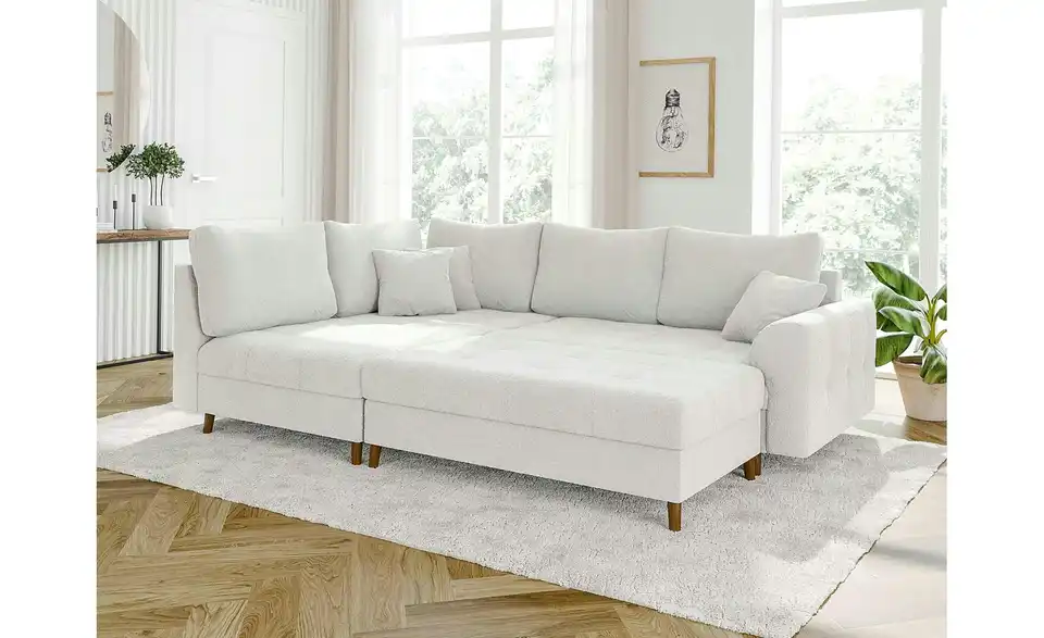 Ecksofa mit Hocker, in Wohnsituation