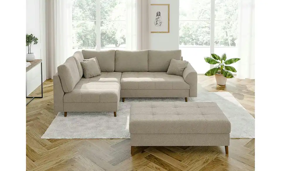 Ecksofa mit Hocker, in Wohnsituation