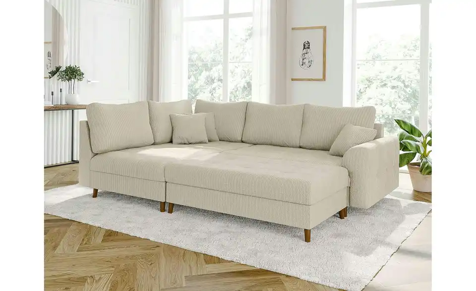 Ecksofa mit Hocker, in Wohnsituation